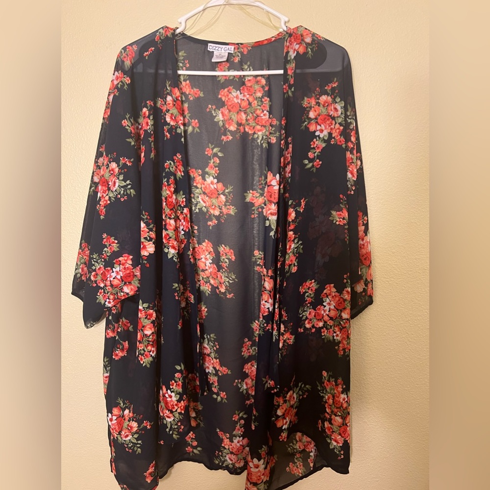 Dizzy Gal/2x/Navy with bursts of orange flowers.